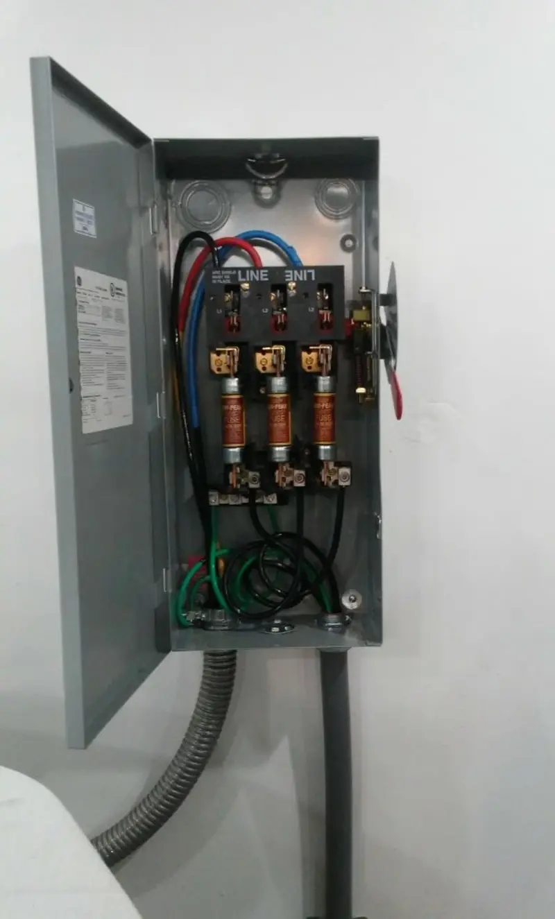 Three-phase disconnect switch installed for Smoke Detector Installation in Stewartville
